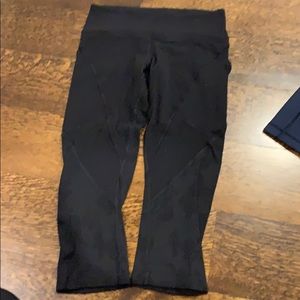 Cropped used but still good with pockets